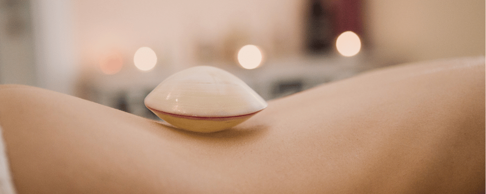 Heated shell used during a relaxing Lava Shell massage at re:new Hair & Beauty in Woodhall Spa