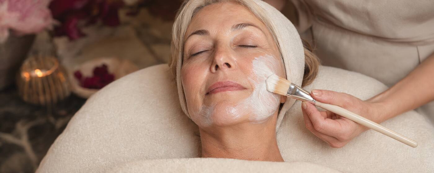 Hydrating facial mask applied during an Age Defence Nourishing Hydrating Facial at re:new Woodhall