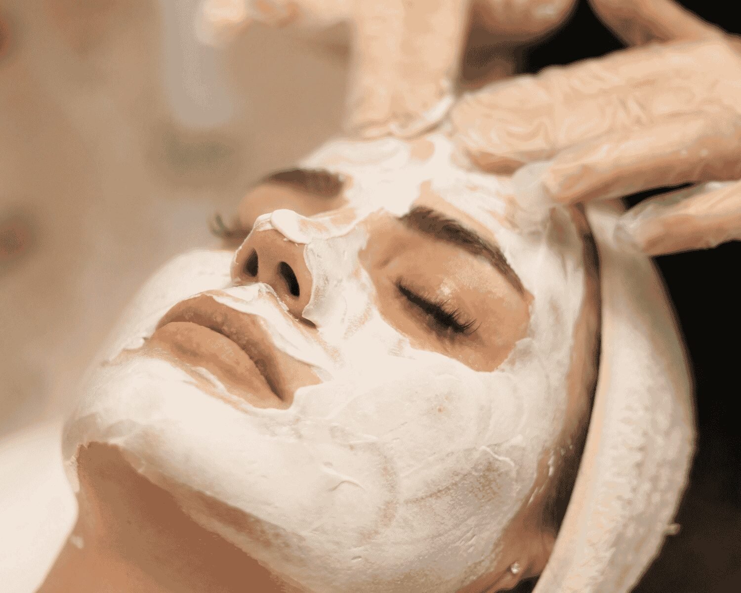 Client enjoying a Katherine Daniels facial treatment at re:new Hair & Beauty in Woodhall Spa