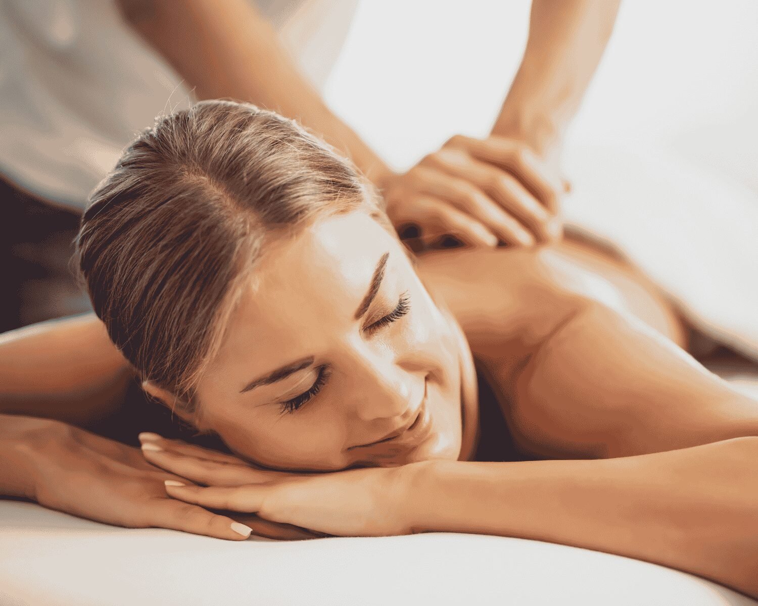 Client enjoying a relaxing massage using Katherine Daniels products at re:new Hair & Beauty in Woodhall Spa