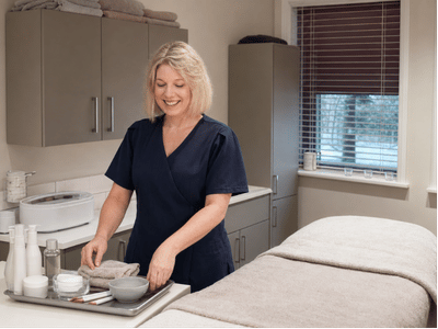 Beauty therapist Shelley preparing the treatment room at re:new Hair & Beauty in Woodhall Spa