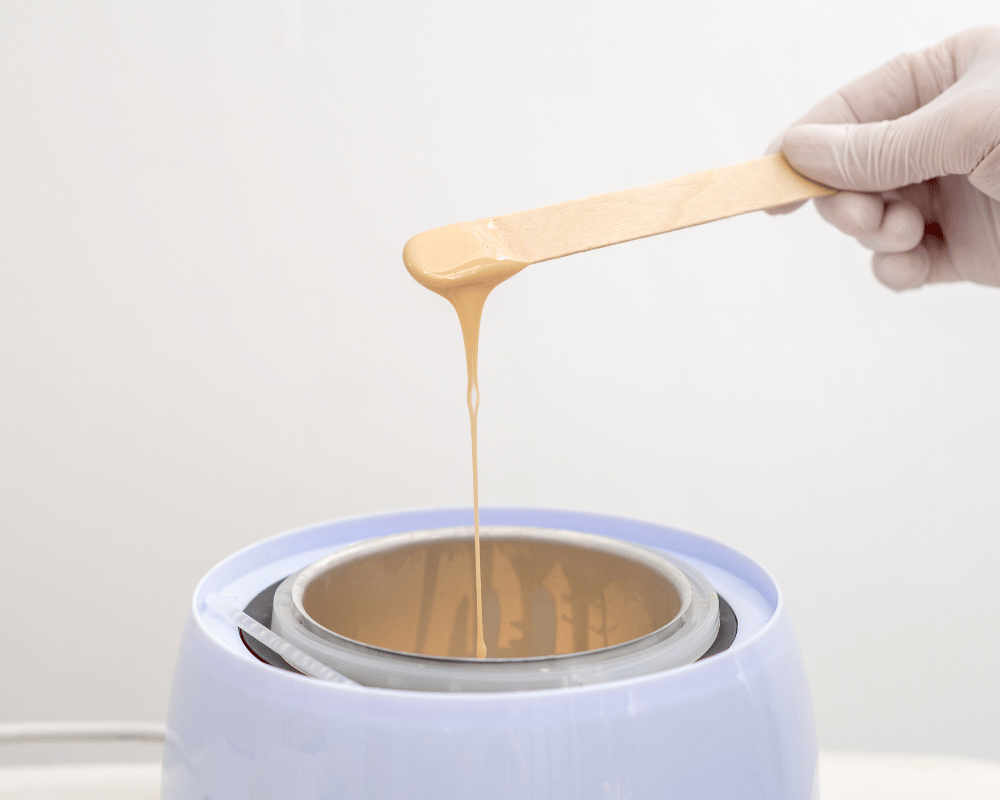 Professional Lycon wax being prepared for a hair-removal treatment at re:new Hair & Beauty in Woodhall Spa