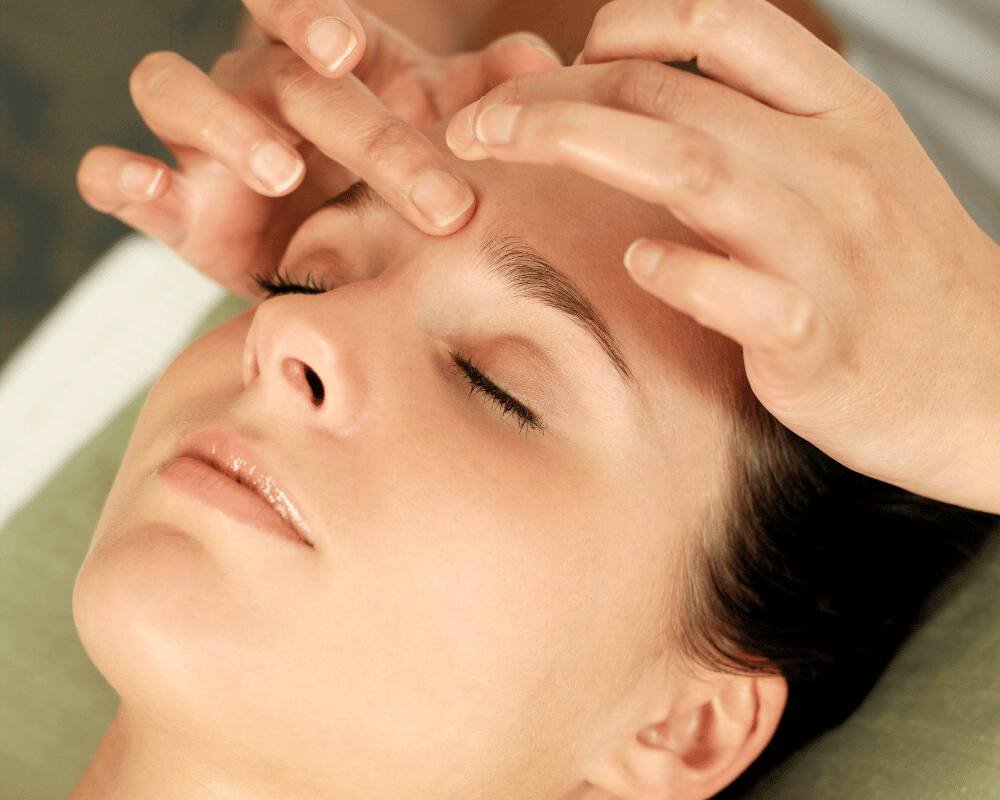 Client enjoying a relaxing Indian head massage at re:new Hair & Beauty in Woodhall Spa