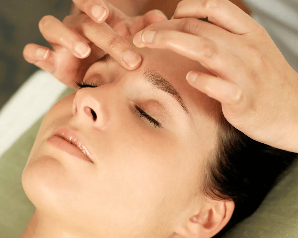 Client enjoying a relaxing Indian head massage at re:new Hair & Beauty in Woodhall Spa