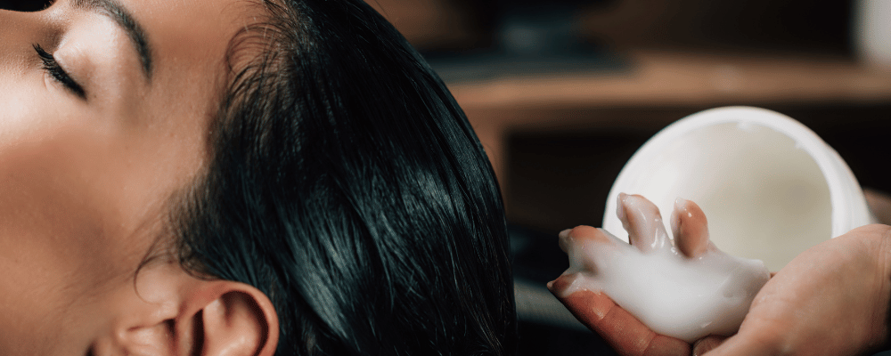 Nourishing conditioning treatment being applied to a client’s hair at re:new salon in Woodhall Spa