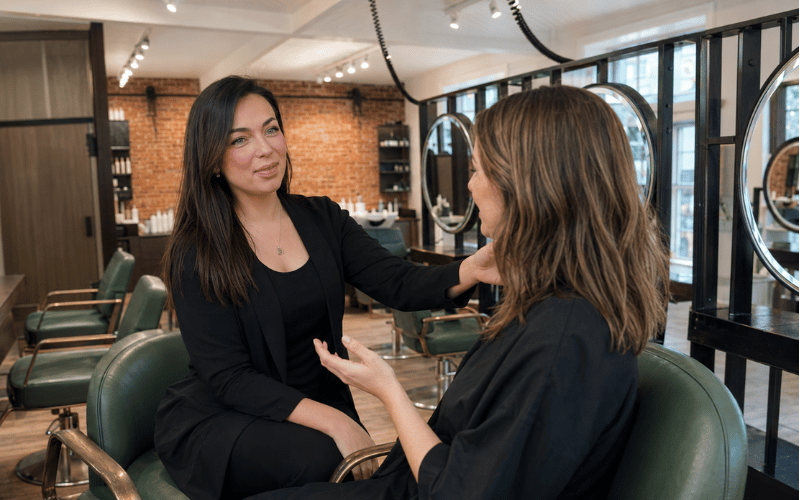 Hair stylist discussing a client’s needs during a personal consultation at re:new salon in Woodhall Spa