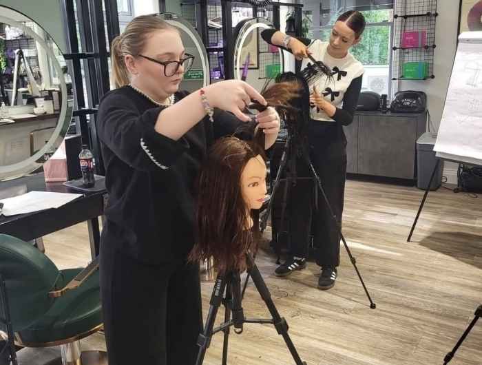 Beauty therapists taking part in a professional training session at re:new Hair & Beauty in Woodhall Spa